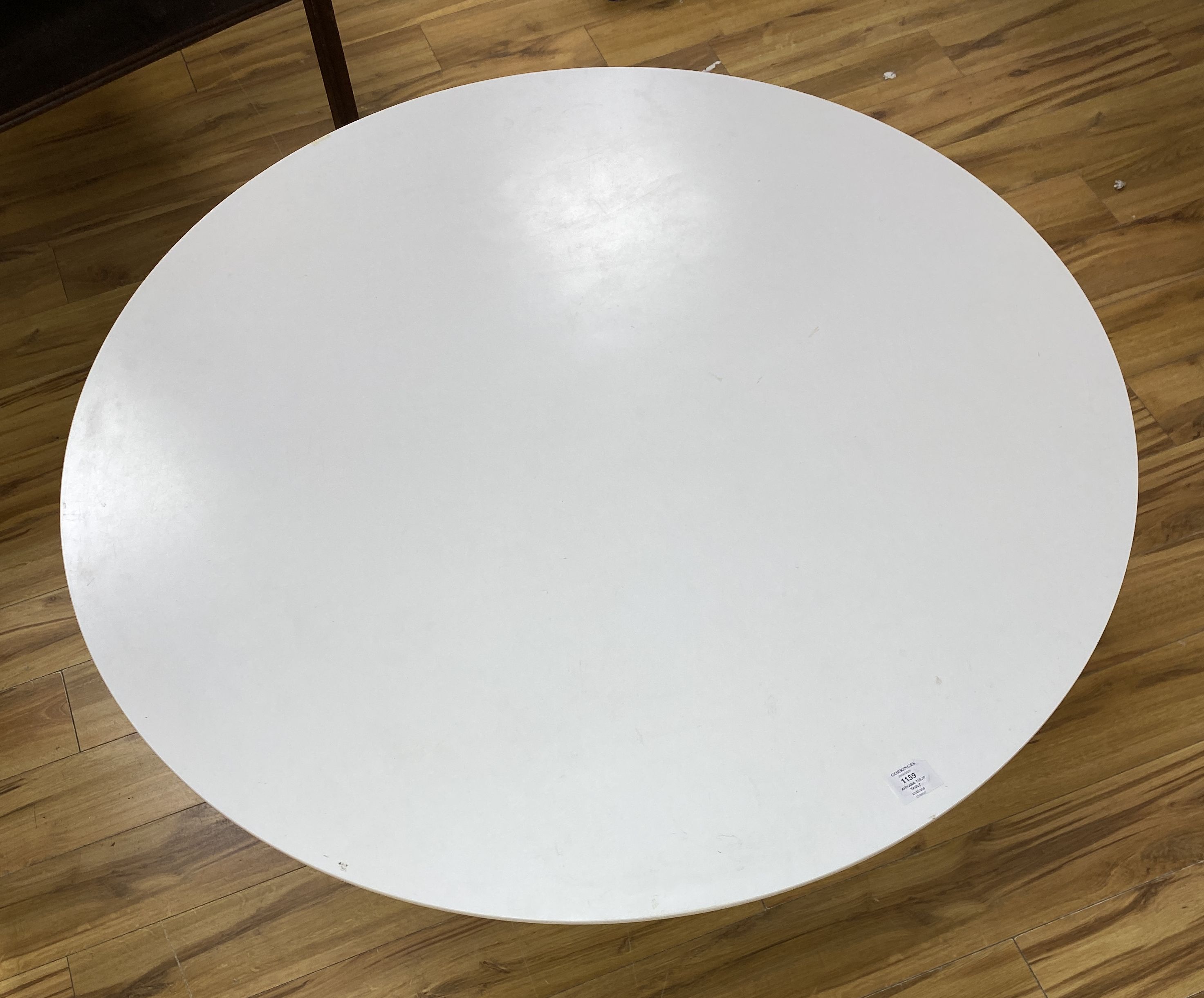 An Arkana tulip table, diameter 106cm height 72cm